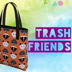 "Trash Friends" tote bag with alternating opossum, raccoon, and skunk faces on an orange background.